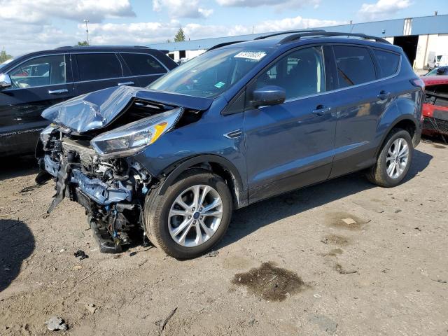 FORD ESCAPE SE 2018 with VIN 1FMCU0GD2JUB70795 - Photo from auction