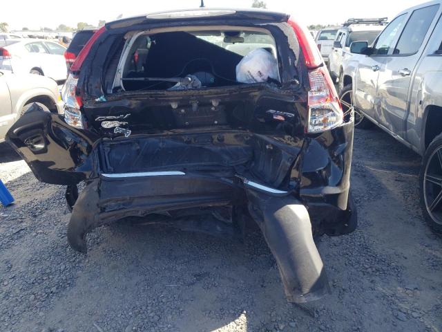 Photo 6 from auction – 2013 HONDA CR-V EXL with VIN 2HKRM4H75DH670656
