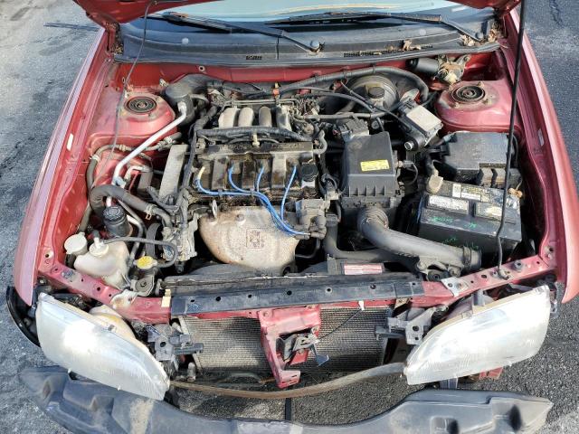 Photo 11 from auction – 1998 MAZDA 626 DX with VIN 1YVGF22C1W5712913
