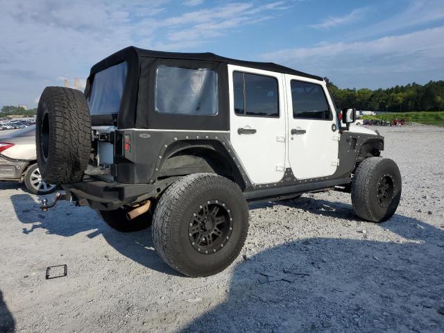 Photo 3 from auction – 2011 JEEP WRANGLER U with VIN 1J4BA3H15BL581821