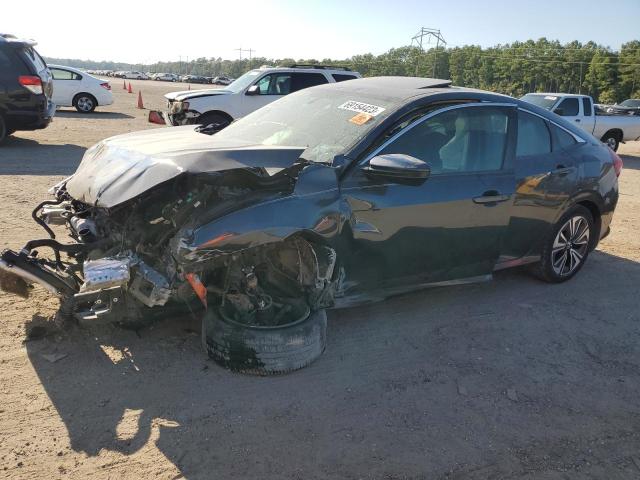 HONDA CIVIC EX 2016 with VIN 19XFC1F31GE022681 - Photo from auction
