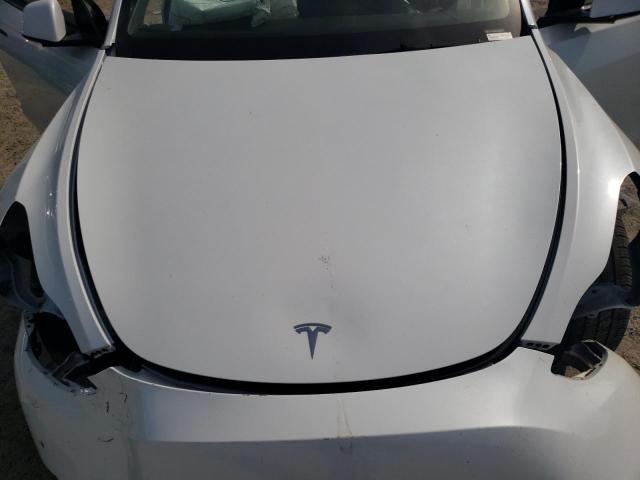 Photo 11 from auction – 2021 TESLA MODEL Y with VIN 5YJYGDED0MF106991