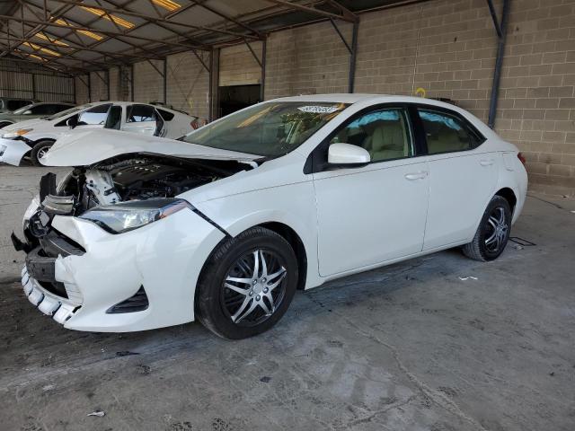 TOYOTA COROLLA L 2017 with VIN 5YFBURHE8HP724991 - Photo from auction