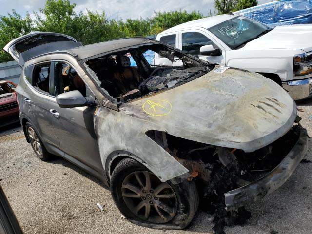 Photo 4 from auction – 2014 HYUNDAI SANTA FE S with VIN 5XYZU3LA2EG232103