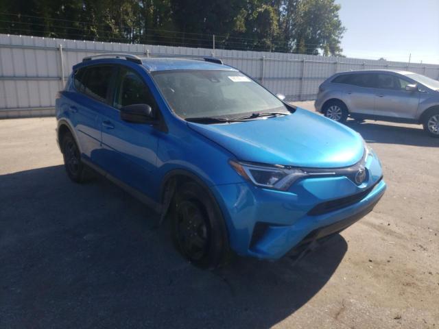 Photo 4 from auction – 2018 TOYOTA RAV4 LE with VIN JTMBFREV6JJ182976