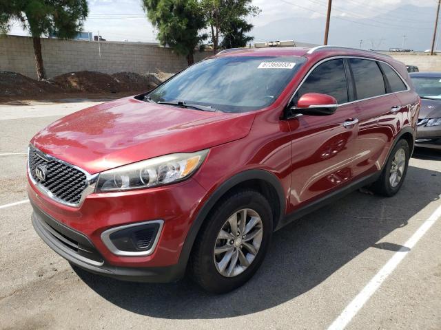 KIA SORENTO LX 2016 with VIN 5XYPG4A32GG087110 - Photo from auction