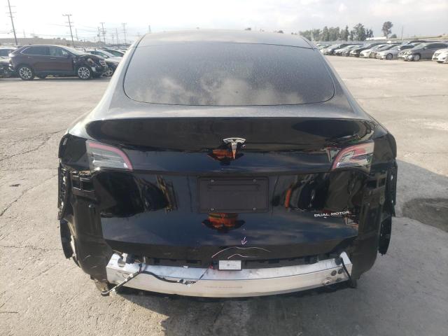 Photo 6 from auction – 2022 TESLA MODEL Y with VIN 7SAYGAEE9NF558448