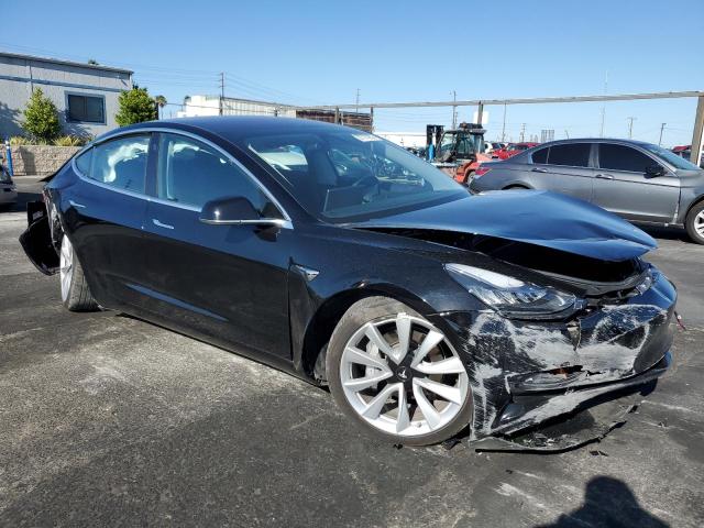 Снимка 4 от търг – 2018 TESLA MODEL 3 с VIN 5YJ3E1EA1JF023554