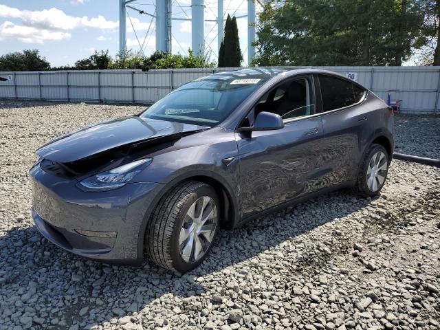 TESLA MODEL Y 2023 with VIN 7SAYGDEE2PA158054 - Photo from auction