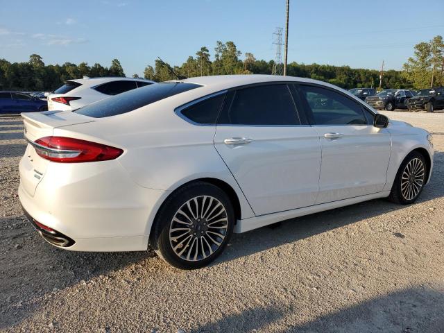 Photo 3 from auction – 2018 FORD FUSION TIT with VIN 3FA6P0K99JR143196