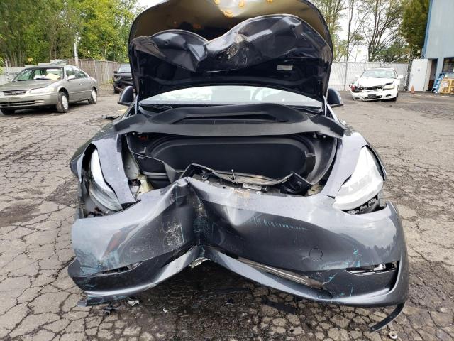 Photo 5 from auction – 2023 TESLA MODEL Y with VIN 7SAYGDEE0PF880867