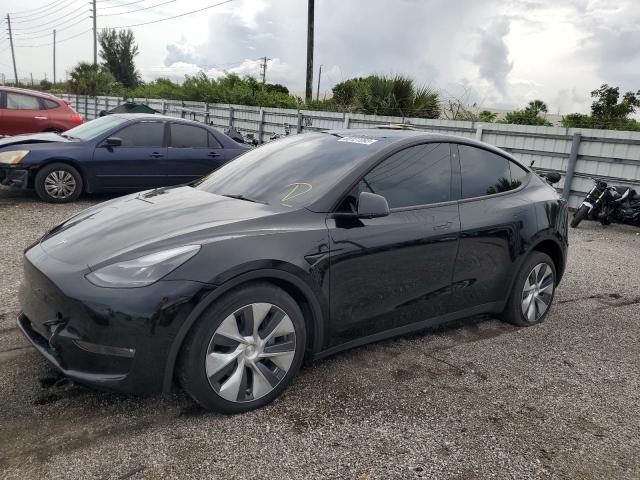 TESLA MODEL Y 2023 with VIN 7SAYGAEE8PF674579 - Photo from auction