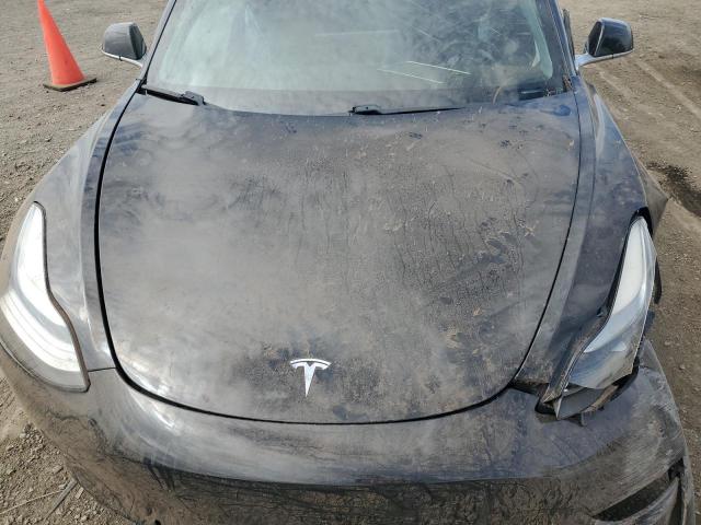 Photo 11 from auction – 2018 TESLA MODEL 3 with VIN 5YJ3E1EA1JF011419