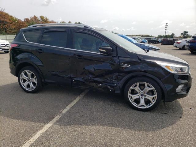 Photo 4 from auction – 2017 FORD ESCAPE TIT with VIN 1FMCU9J91HUB84898
