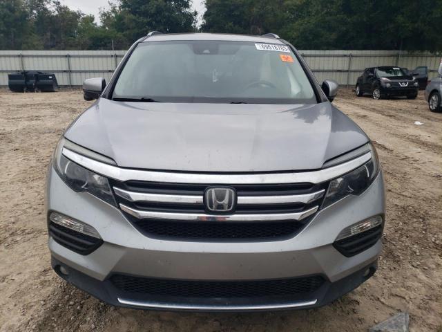 Photo 5 from auction – 2017 HONDA PILOT TOUR with VIN 5FNYF5H96HB030652