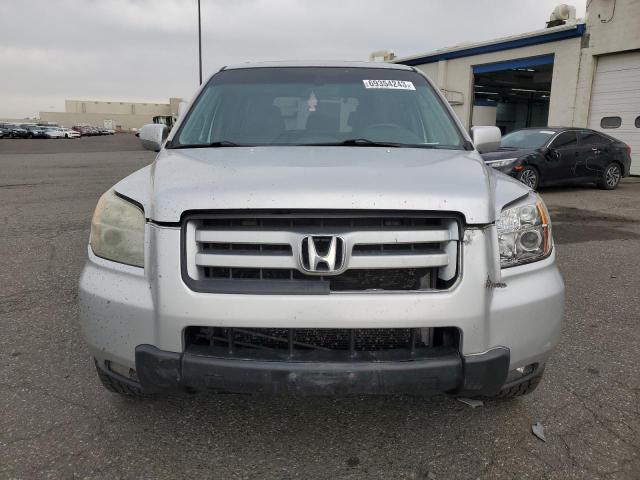 Photo 5 from auction – 2006 HONDA PILOT EX with VIN 2HKYF18556H555173