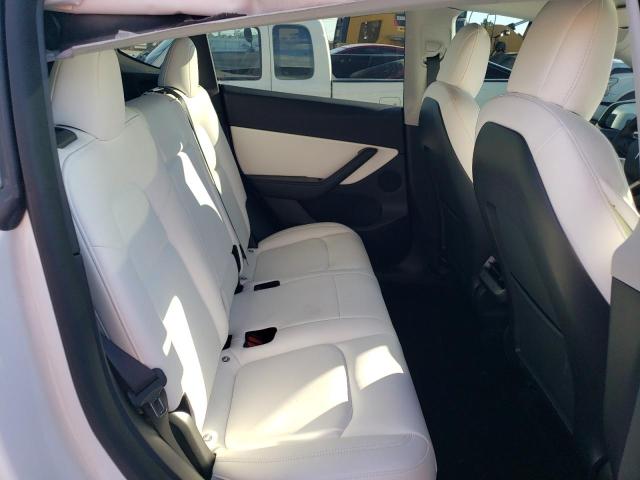 Photo 10 from auction – 2021 TESLA MODEL Y with VIN 5YJYGDEE0MF201379