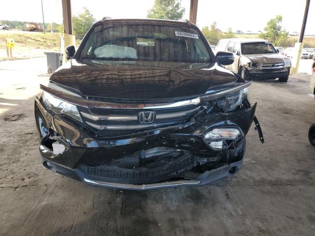 Photo 5 from auction – 2017 HONDA PILOT ELIT with VIN 5FNYF6H02HB062554