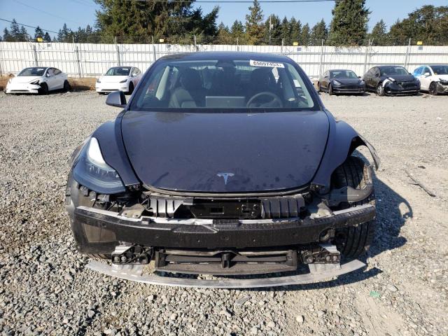 Photo 5 from auction – 2022 TESLA MODEL 3 with VIN 5YJ3E1EB0NF334438