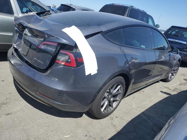 Photo 3 from auction – 2021 TESLA MODEL 3 with VIN 5YJ3E1EB8MF868513