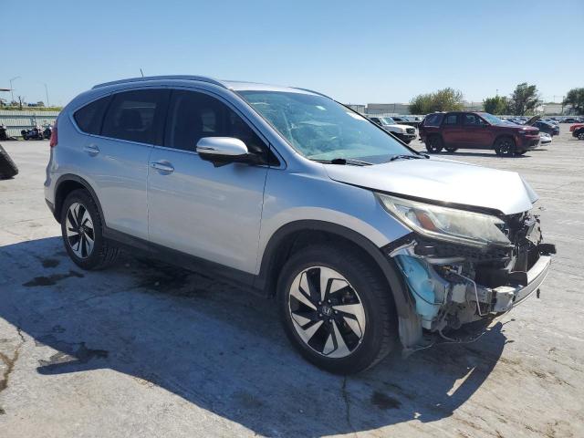 Photo 4 from auction – 2015 HONDA CR-V TOURI with VIN 5J6RM3H97FL025611