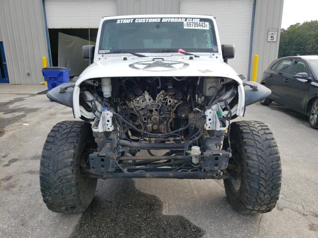 Photo 5 from auction – 2016 JEEP WRANGLER U with VIN 1C4BJWDG5GL118229