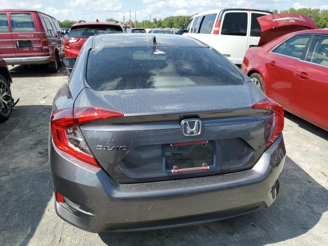 Photo 6 from auction – 2018 HONDA CIVIC EX with VIN 19XFC2F77JE038514