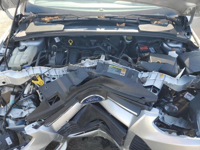 Снимка 11 от търг – 2012 FORD FOCUS SE с VIN 1FAHP3F21CL193468