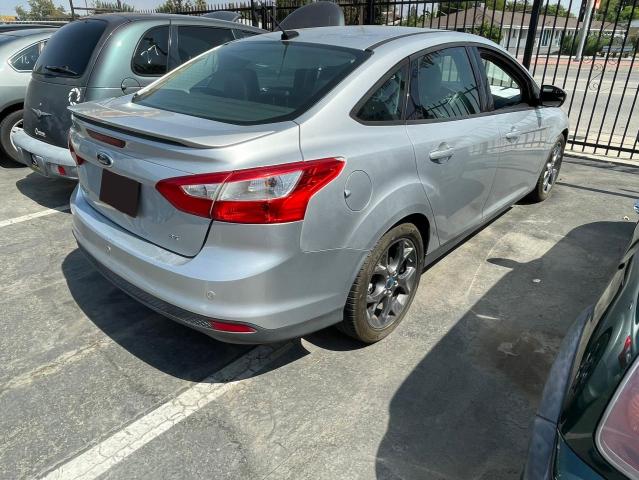 Photo 4 from auction – 2013 FORD FOCUS SE with VIN 1FADP3F28DL170818