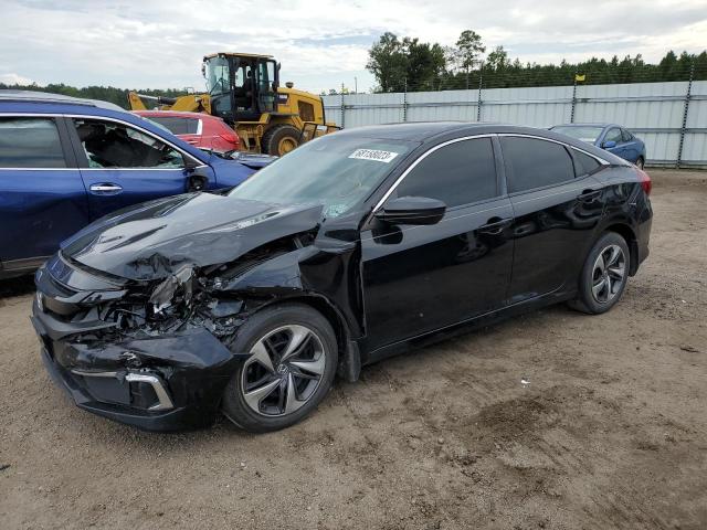 HONDA CIVIC LX 2019 with VIN 19XFC2F62KE031883 - Photo from auction