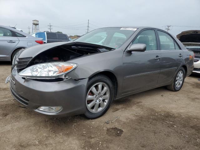 TOYOTA CAMRY LE 2004 with VIN 4T1BE30K34U811525 - Photo from auction