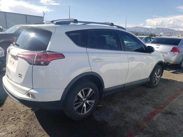 Photo 3 from auction – 2018 TOYOTA RAV4 ADVEN with VIN 2T3RFREV6JW857130