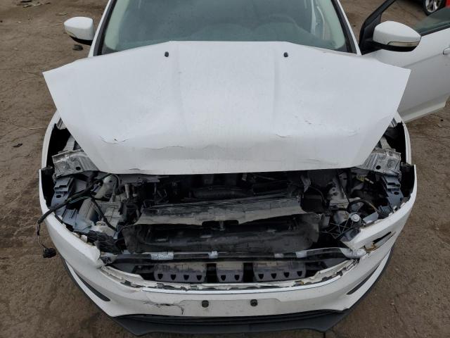 Photo 11 from auction – 2015 FORD FOCUS SE with VIN 1FADP3F22FL206375