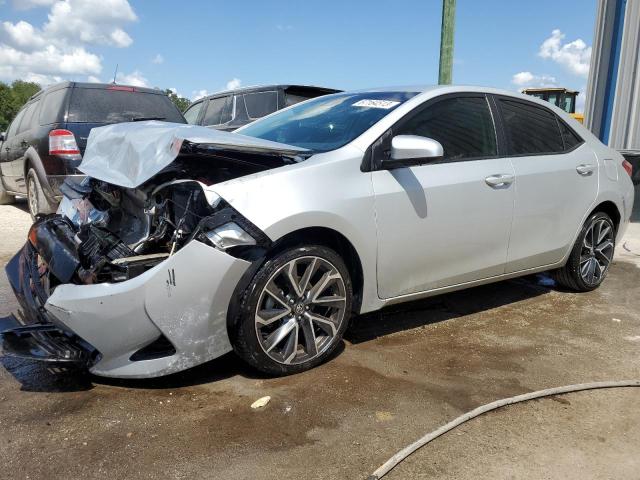 TOYOTA COROLLA L 2019 with VIN 5YFBURHE4KP867718 - Photo from auction