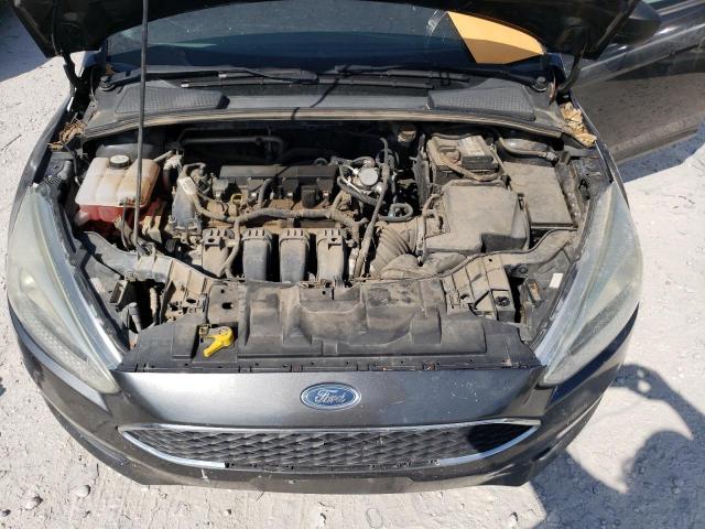 Photo 11 from auction – 2016 FORD FOCUS S with VIN 1FADP3E27GL328636