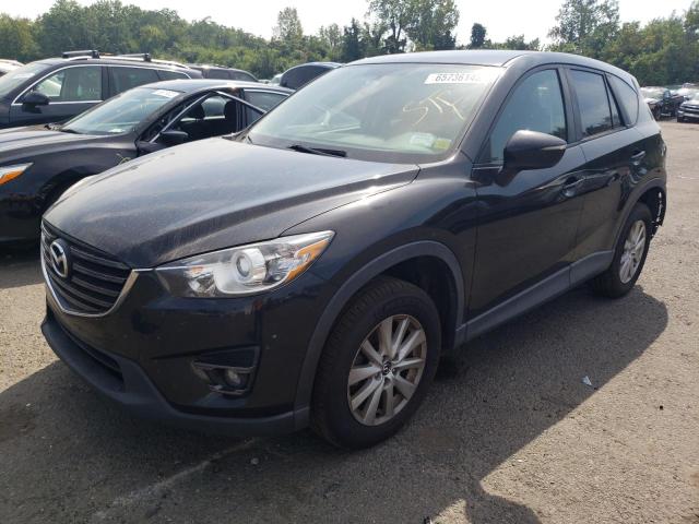 MAZDA CX-5 TOURI 2016 with VIN JM3KE4CY9G0726718 - Photo from auction