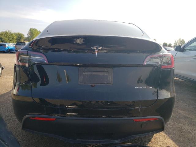 Photo 6 from auction – 2022 TESLA MODEL Y with VIN 7SAYGDEEXNF574711