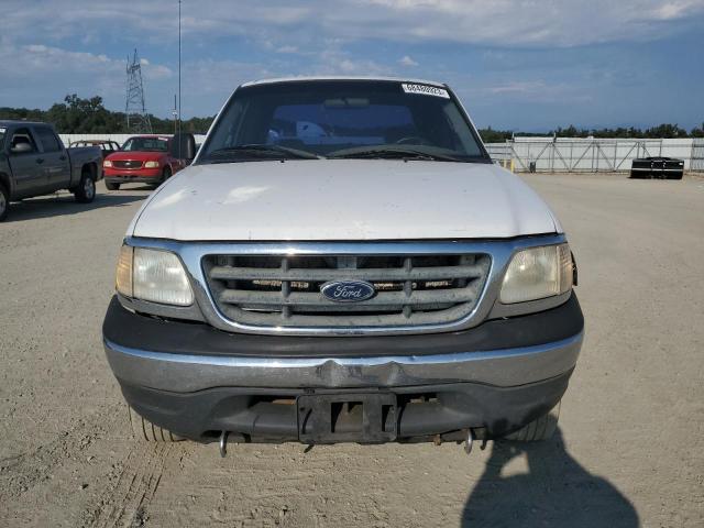 Photo 5 from auction – 2001 FORD F150 with VIN 1FTRX18L91NB21444