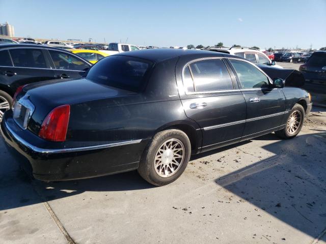 Photo 3 from auction – 2002 LINCOLN TOWN CAR S with VIN 1LNHM82W82Y629366