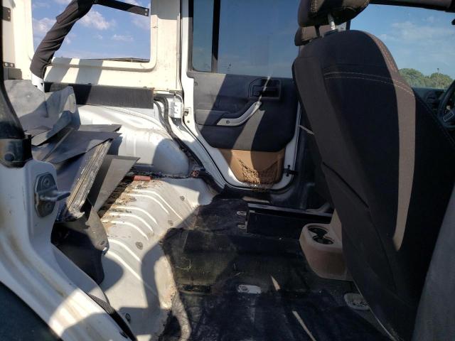 Photo 10 from auction – 2015 JEEP WRANGLER U with VIN 1C4BJWFG7FL625953