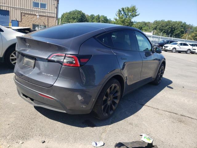 Photo 3 from auction – 2022 TESLA MODEL Y with VIN 7SAYGAEE1NF382530