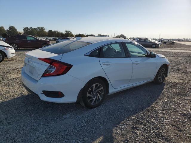 Photo 3 from auction – 2017 HONDA CIVIC EX with VIN 2HGFC2F76HH506216