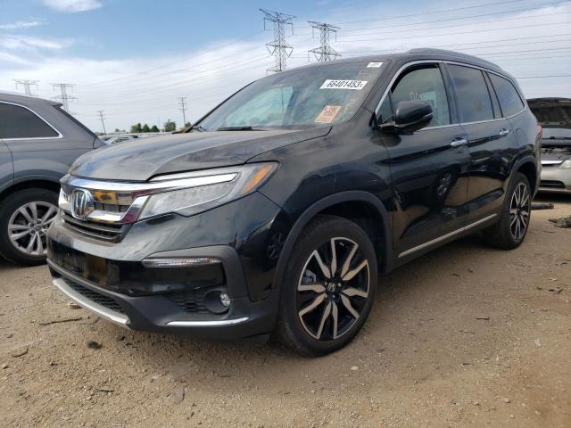 HONDA PILOT TOUR 2021 with VIN 5FNYF6H97MB004559 - Photo from auction