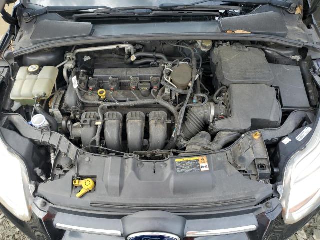 Photo 11 from auction – 2013 FORD FOCUS SE with VIN 1FADP3F28DL320944