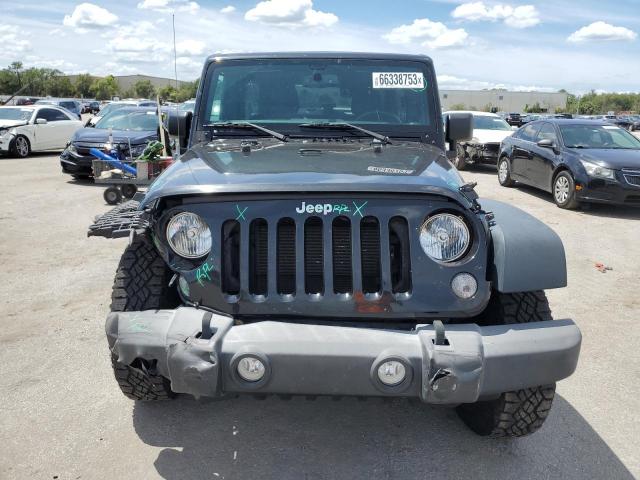 Photo 5 from auction – 2016 JEEP WRANGLER U with VIN 1C4BJWDG6GL233227