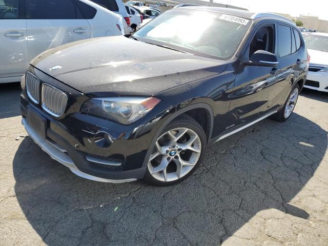 BMW X1 SDRIVE2 2015 with VIN WBAVM1C51FVZ93878 - Photo from auction