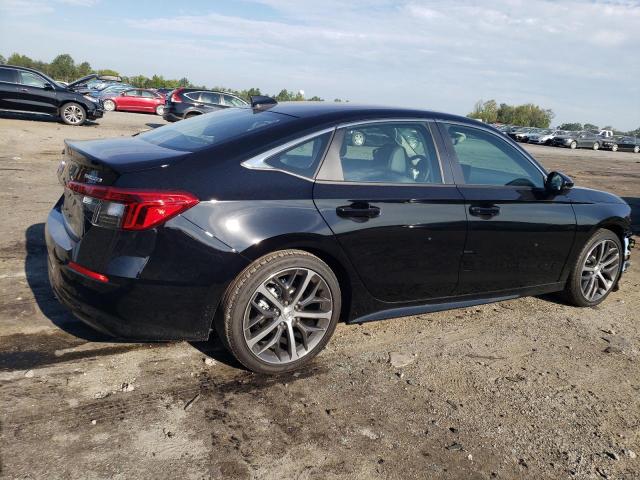 Photo 3 from auction – 2023 HONDA CIVIC TOUR with VIN 2HGFE1F95PH323071