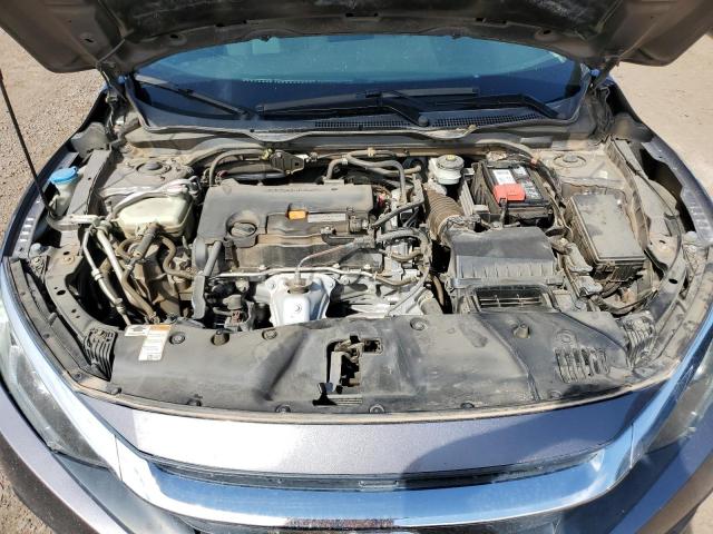 Photo 11 from auction – 2018 HONDA CIVIC EX with VIN 19XFC2F77JE015444