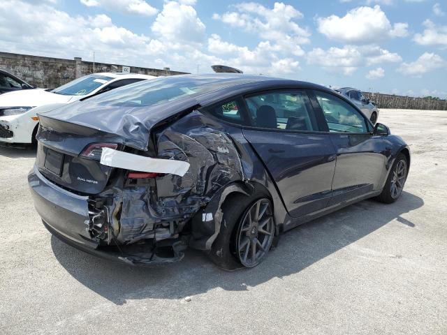 Photo 3 from auction – 2021 TESLA MODEL 3 with VIN 5YJ3E1EBXMF060163