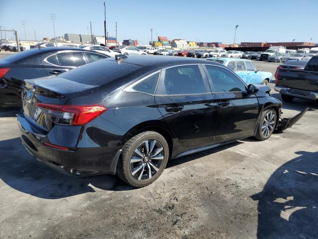 Photo 3 from auction – 2022 HONDA CIVIC EX with VIN 2HGFE1F71NH320731